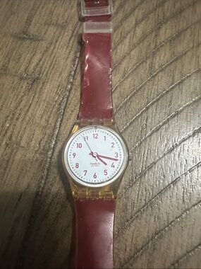 Swatch Kids Watch with Red Strap and Clear Amber Case